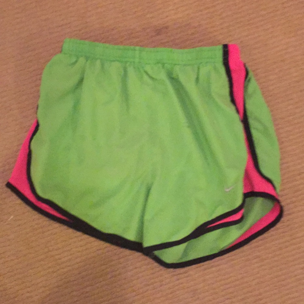 Green and pink nike shorts